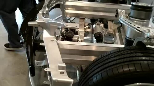 Tesla S.. Battery pack and drivetrain close up walk around view